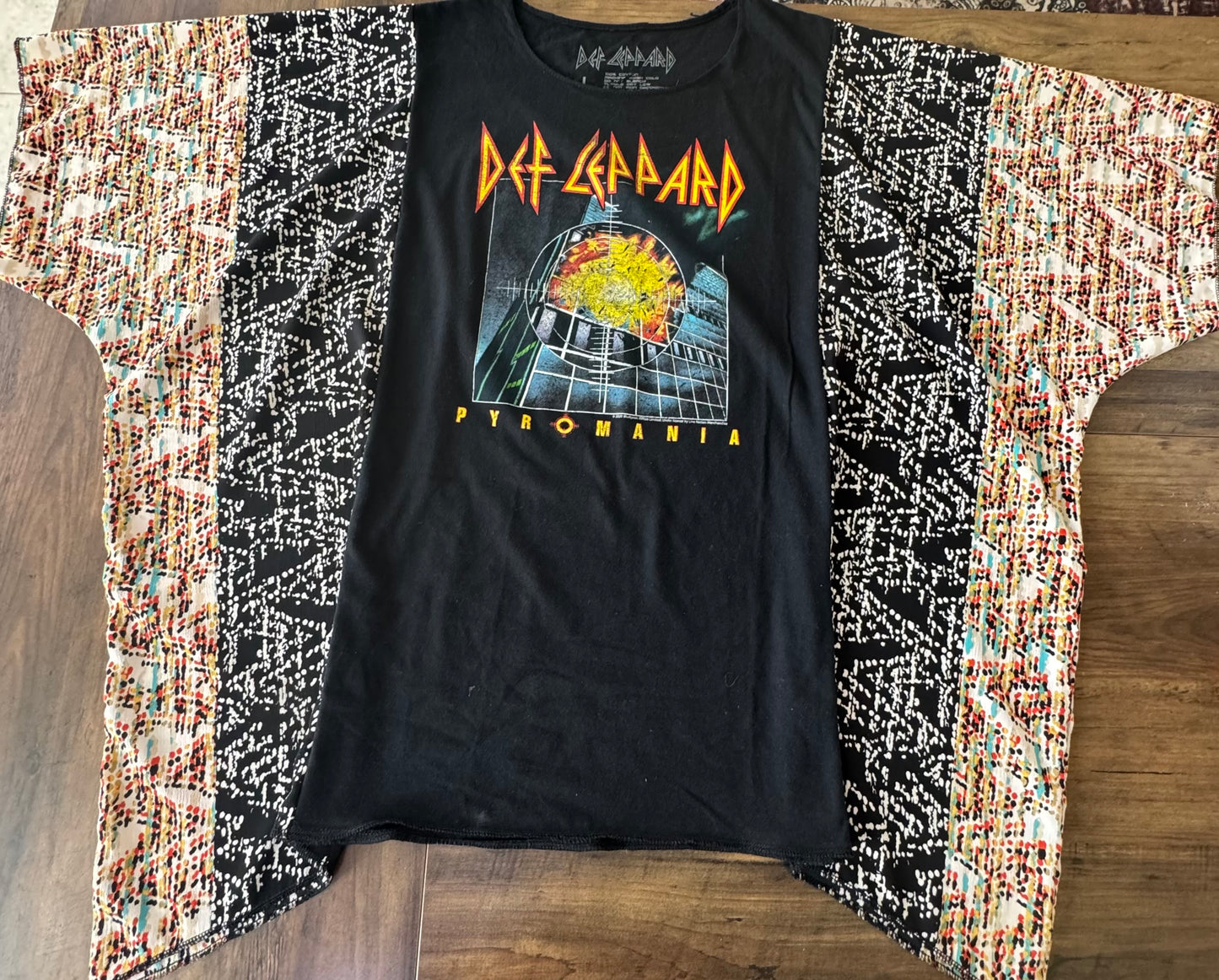 "Def Leppard" Black T-Shirt with multicolor sheer sleeves.  One Size Fits S-2X